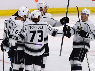 Los Angeles Kings players celebrate a first period goal against the Ottawa Senators during first period NHL action in Ottawa on Tuesday October 24, 2017. THE CANADIAN PRESS/Sean Kilpatrick