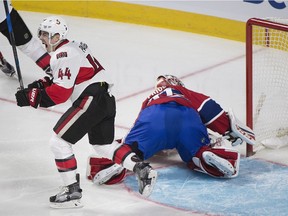 Senators forward Jean-Gabriel Pageau celebrates a goal by teammate Tom Pyatt (not shown) against Canadiens netminder Carey Price during a game in Montreal last season. THE CANADIAN PRESS/Graham Hughes