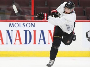 Logan Brown fires a shot during Senators practice at Canadian Tire Centre on Monday.  Jean Levac/Postmedia