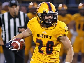 Queen's running back Jake Puskas, who had 10 carries for 49 yards against McMaster on Saturday. Ian MacAlpine/Postmedia