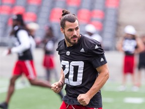 Linebacker JP Bolduc covers a runner as the Ottawa Redblacks practice at TD Place.
