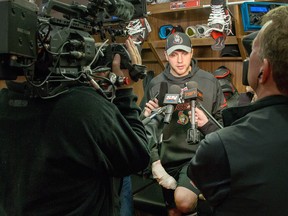 Forward Bobby Ryan meets with the media in the dressing room with his broken finger iced up following the Ottawa Senators practice at Canadian Tire Centre on Wednesday in advance of their next game on Thursday evening. Ryan did not skate and is out indefinitely until the finger is healed.