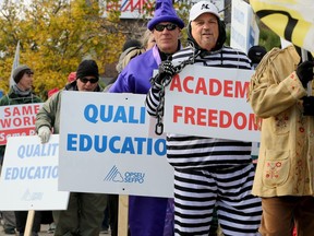 Some dressed up for Halloween while others simply carried placards, but more than a hundred Algonquin teachers protested outside of Bob Chiarelli's office on Carling Avenue Tuesday (October 31, 2017). The faculty are out on strike, calling for more full-time, permanent positions at the college.