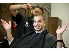 Ibrahim Musa, seen here getting a quick trim from barber Bekkir Bouzioukh at Hairfellas in downtown Ottawa, is the founder and Executive Director of the Cuts for Kids Foundation.  Musa has come a long way since coming to Canada as a refugee from Iraq as a child. He's lived in Ottawa Community Housing since 2002 and has demonstrated support for youth in the area. When you're financially challenged a simple haircut is a luxury, but it's also an important part of self esteem for youth, he believes.   Musa is only 19 years old, in his second year at the University of Ottawa and now his program has a staff of nine, 60 volunteers and has partnered with more than 30 organizations. He hopes to spread Cuts for Kids, which has just gained charity status, across the country in the coming years.  Julie Oliver/Postmedia
Julie Oliver, Postmedia