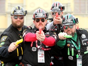 The CFL Fun Police, including (from left): Kirk Blake, Corey Pusey, Dave Hanni and Jeff Murray, were striking poses, to the amusement of fans at the Grey Cup Festival site.  Lansdowne Park was starting to fill up with football fans Friday, gearing up for the Grey Cup this Sunday.