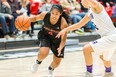 Point guard Jenjen Abella's savvy execution was critical
to the Carleton Ravens seventh consecutive Ontario University Athletics win
on Saturday at the Raven's Nest. (VALERIE WUTTI/PHOTO)