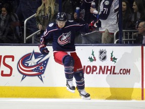 Columbus Blue Jackets’ Cam Atkinson celebrates one of his goals against the Sens on Friday night. (THE ASSOCIATED PRESS)
