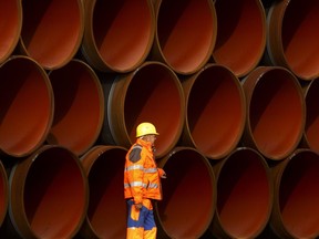 Nord Stream 2 Pipeline Construction Continues

SASSNITZ, GERMANY - OCTOBER 19: A worker walks in front of pipes which lie stacked at the Nord Stream 2 facility at Mukran on Ruegen Islandon October 19, 2017 in Sassnitz, Germany. Nord Stream is laying a second pair of offshore pipelines in the Baltic Sea between Vyborg in Russia and Greifswald in Germany for the transportation of Russian natural gas to western Europe. An initial pair of pipelines was inaugurated in 2012 and the second pair is due for completion by 2019. A total of 50,000 pipes are currently on hand at Mukran, where they receive a concrete wrapping before being transported out to sea. Russian energy supplier Gazprom, whose board is led by former German chancellor Gerhard Schroeder, owns a 51% stake in Nord Stream. (Photo by Carsten Koall/Getty Images)
Carsten Koall, Getty Images