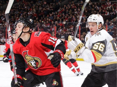 Ryan Dzingel #18 of the Ottawa Senators battles for position against Erik Haula #56 of the Vegas Golden Knights.