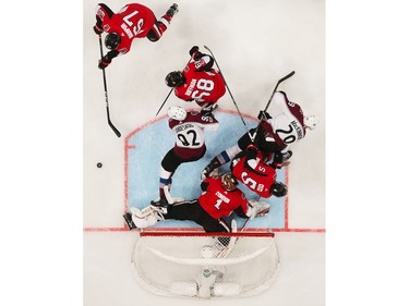 A bird's-eye view of the action in the crease of Sens goalie Mike Condon.