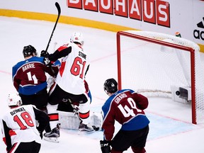 Senators winger Mark Stone (61) tips a shot into the net for his first goal of the game in the opening period. Stone also scored the winning goal in overtime against the Avalanche on Friday.  AFP PHOTO/TT NEWS AGENCY/Erik SIMANDER