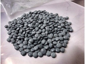 Fentanyl pills are shown in an undated police handout photo.