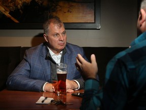 Sports reporter Tim Baines sits down for beer and a Q&A with CFL Commissioner Randy Ambrosie, at The Keg in Ottawa's Byward Market on Nov. 21, 2017
