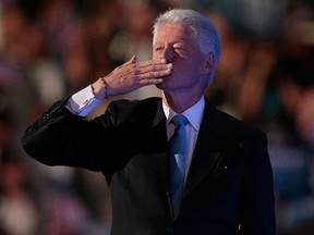 Former U.S. President Bill Clinton blows a kiss towards the box with wife U.S. Sen. Hillary Clinton (D-NY) and daughter Chelsea after his speech during day three of the Democratic National Convention (DNC) at the Pepsi Center Aug. 27, 2008 in Denver, Colo. (Win McNamee/Getty Images)