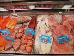 Fresh fish in supermarket display.