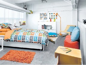 Kid-friendly artwork and accessories, a jaunty lamp, wicker floor chair and bedding featuring stylized cars give the room a vibrant look.