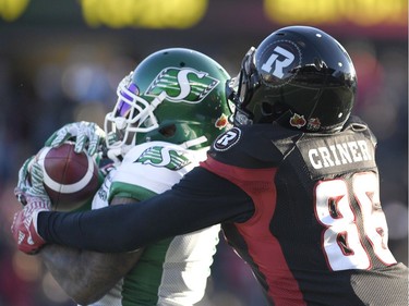 Juron Criner Jovon Johnson

Saskatchewan Roughriders' Jovon Johnson (1) makes an interception against Ottawa Redblacks' Juron Criner (86) during second half Eastern semifinal CFL action in Ottawa on Sunday, Nov. 12, 2017. THE CANADIAN PRESS/Justin Tang ORG XMIT: JDT116
Justin Tang,