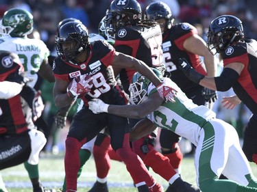 William Powell Tobi Antigha

Ottawa Redblacks' William Powell (29) fends off Saskatchewan Roughriders' Tobi Antigha (92) in Eastern semifinal CFL action in Ottawa on Sunday, Nov. 12, 2017. THE CANADIAN PRESS/Justin Tang ORG XMIT: JDT108
Justin Tang,