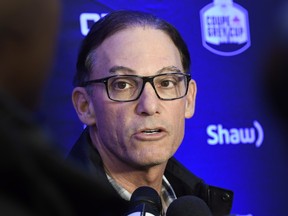 Toronto Argonauts head coach Marc Trestman speaks to reporters after arriving at the airport in Ottawa, ahead of his team's Grey Cup match against the Calgary Stampeders, on Tuesday, Nov. 21, 2017. THE CANADIAN PRESS/Justin Tang