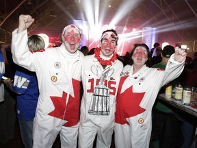 Kingston fans, left to right, Kevin Delph, Aaron Delph and Kathi Deplanche from Kingston join in the fun on Saturday evening.