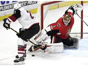 Coyotes centre Derek Stepan directs a shot at Senators goaltender Mike Condon during Saturday's game in Ottawa. THE CANADIAN PRESS/Justin Tang