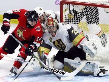 Ottawa Senators right wing Alex Burrows (14) scores on a backhand against Vegas Golden Knights goalie Maxime Lagace.