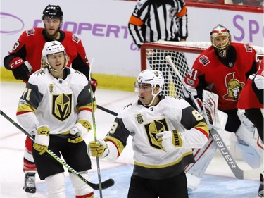 Vegas Golden Knights right wing Alex Tuch (89) celebrates his goal with centre William Karlsson (71) as Ottawa Senators goalie Craig Anderson (41) and defenceman Fredrik Claesson (33) look on.