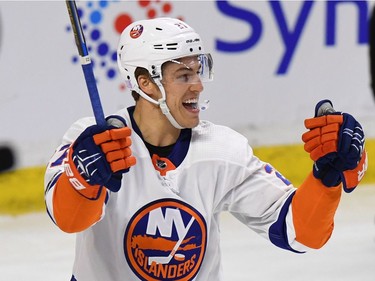 New York's Anders Lee celebrates his second-period goal against the Senators. THE CANADIAN PRESS/Justin Tang