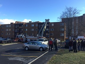 Firefighters continue to work on two-alarm apartment blaze on Jasmine Crescent at Ogilvie in east end. Wayne Cuddington