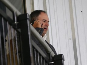General Manager Pierre Dorion works the phone during the Ottawa Senators rookie training camp at Bell Sensplex in Ottawa, September 7, 2017.