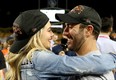 Justin Verlander of the Houston Astros celebrates with fiancee Kate Upton after the Astros defeated the Los Angeles Dodgers 5-1 in game seven to win the 2017 World Series at Dodger Stadium on November 1, 2017 in Los Angeles, California.