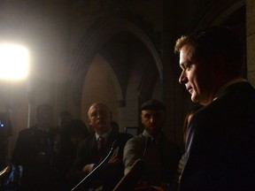 Conservative leader Andrew Scheer speaks with the media in the Foyer of the House of Commons Wednesday, Nov. 29, 2017.