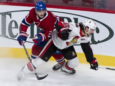 The Ottawa Senators' Erik Karlsson tries to break away from the Montreal Canadiens' Phillip Danault.