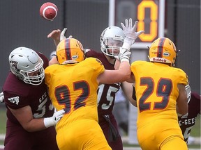 Gee-Gees vs Gaels

Quarterback Alex Lavric from Ottawa Gee-Gees throws a pass against the Queen's Gaels in Ottawa Ontario Monday Sept 4, 2017.   Tony Caldwell
Tony Caldwell
