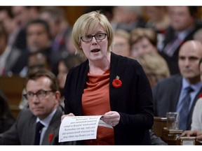 Public Services and Procurement Minister Carla Qualtrough responds to a question during Question Period in the House of Commons, in Ottawa on Tuesday, October 31, 2017. The minister responsible for the problem-plagued Phoenix pay system says a backlog of outstanding transactions being dealt with by the federal pay centre has spiked to 520,000.THE CANADIAN PRESS/Adrian Wyld ORG XMIT: CPT132

Oct.31, 2017 file photo
Adrian Wyld,