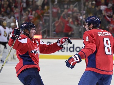 Washington Capitals left wing Alex Ovechkin (8), of Russia, celebrates his goal with center Nicklas Backstrom, of Sweden, during the first period of an NHL hockey game against the Ottawa Senators, Wednesday, Nov. 22, 2017, in Washington.