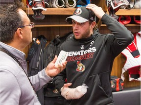 Forward Bobby Ryan meets with the media in the dressing room shortly after breaking his right index finger by blocking a shot. Wayne Cuddington/ Postmedia