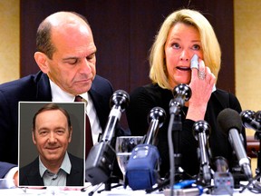 Former Boston news anchor Heather Unruh sits with her attorney Mitchell Garabedian at a press conference in Boston November 8, 2017 during which she accused actor Kevin Spacey of allegedly sexually abusing her son in July 2016 at the Club Carr restaurant on Nantucket Island. Projects are shelved, film releases cancelled, sets shuttered, studios threatened, the Oscars rattled -- this is the chaos confronting Hollywood following sex scandals that have brought down power players like Harvey Weinstein, Kevin Spacey and Brett Ratner. / AFP PHOTO / Joseph PREZIOSOJOSEPH PREZIOSO/AFP/Getty Images