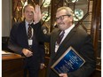 Toronto Press and Media Club President, Ed Patrick inducts Mark Bonokoski into the Canadian News Hall of Fame at the Toronto Press and Media Club on Tuesday November 21, 2017.