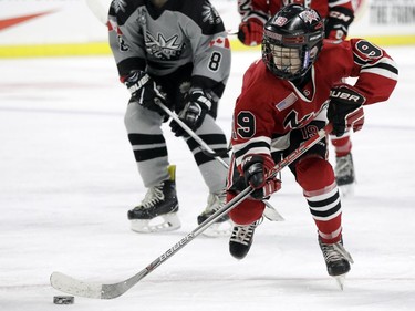 The Syracuse Nationals' Mathew Gilmore stickhandles the puck up the ice against the Ottawa Valley Silver Seven in the minor peewee AAA final.