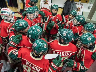 Players on the Eastern Ontario Wild get amped before the major peewee AAA championship game against the Providence Capitals on Sunday.