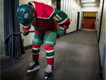 Eastern Ontario Wild's Ryan Rutley takes a moment before stepping onto the ice for the major peewee AAA championship game against the Providence Capitals at Canadian Tire Centre.