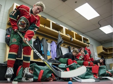 Eastern Ontario's Marco McCarthy prepares in the locker room before facing the Providence Capitals in the major peewee AAA championship game of the 19th annual Bell Capital Cup.