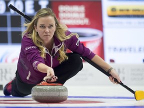 Chelsea Carey of Calgary throws a stone during Olympic curling trials in Ottawa on Tuesday morning.