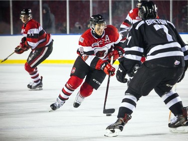 Ottawa 67's #8 Sasha Chmelevski brings the puck down the ice during the outdoor game against the Gatineau Olympiques at TD Place Sunday December 17, 2017.   Ashley Fraser/Postmedia