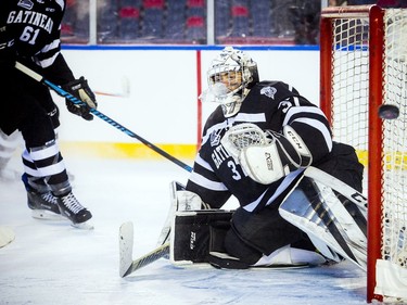 Gatineau Olympiques #37 Tristan Berube makes a save against the Ottawa 67's at TD Place for an outdoor game Sunday December 17, 2017.   Ashley Fraser/Postmedia