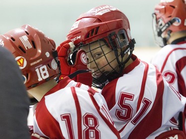 St. Clair Shores' Lucas Larson (51) keeps an eye on the action from the bench during overtime.   Ashley Fraser/Postmedia