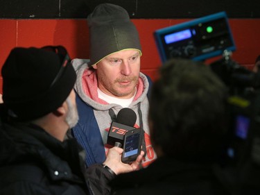 Former captain Daniel Alfredsson chats with the media.