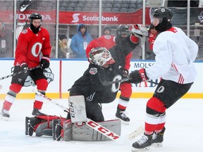 Mike Condon of the Ottawa Senators makes the save during morning practice on the outdoor rink at TD Place, December 10, 2017.