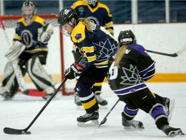 Yukon, in purple, took on Alberta in Friday's Canada 150 division play. The Albertans won 5-0.  Julie Oliver/Postmedia